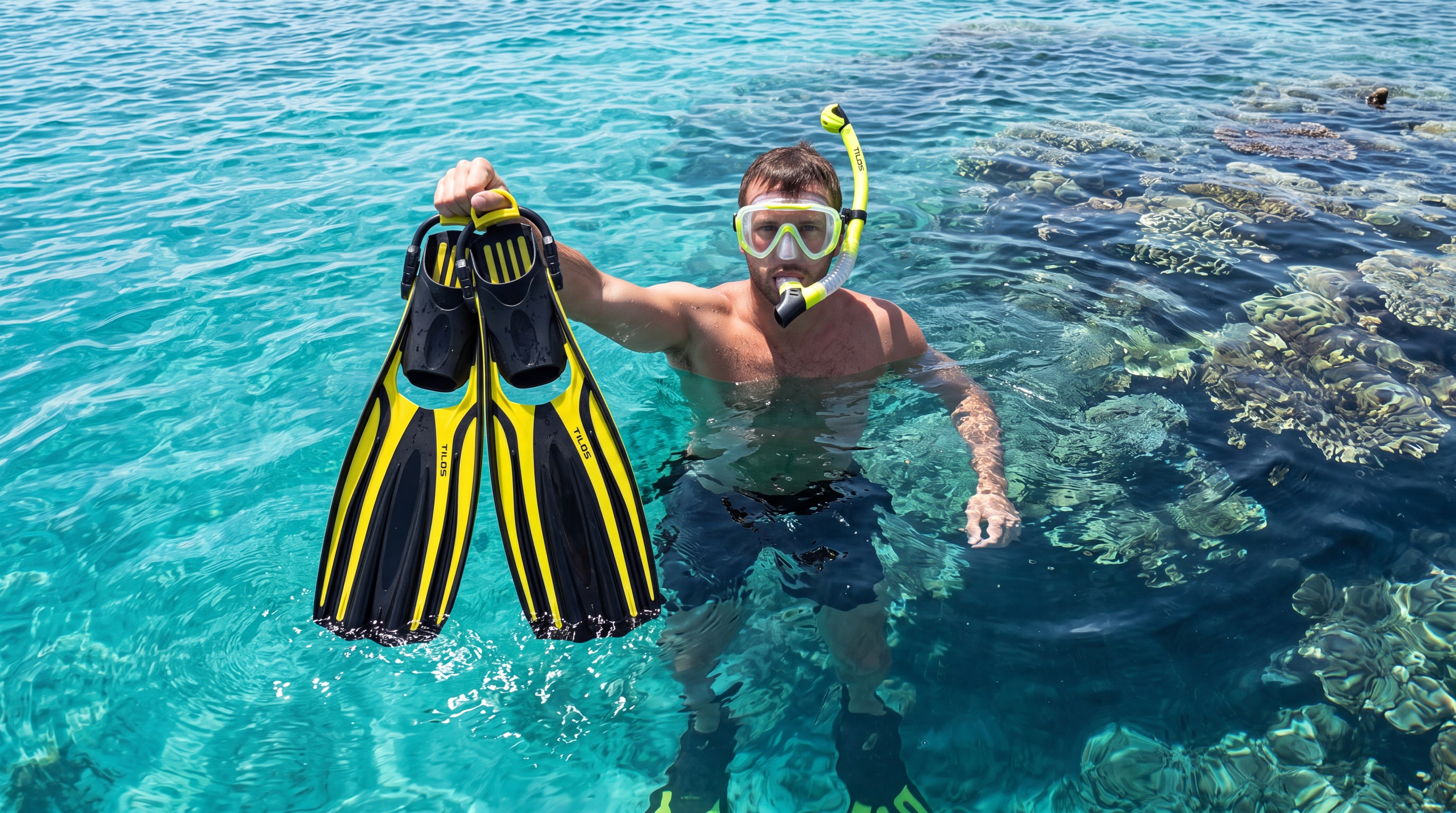 Snorkeler using the Tilos Morphi Mask, Orion Snorkel and Forager Fins Set in Yellow — worn