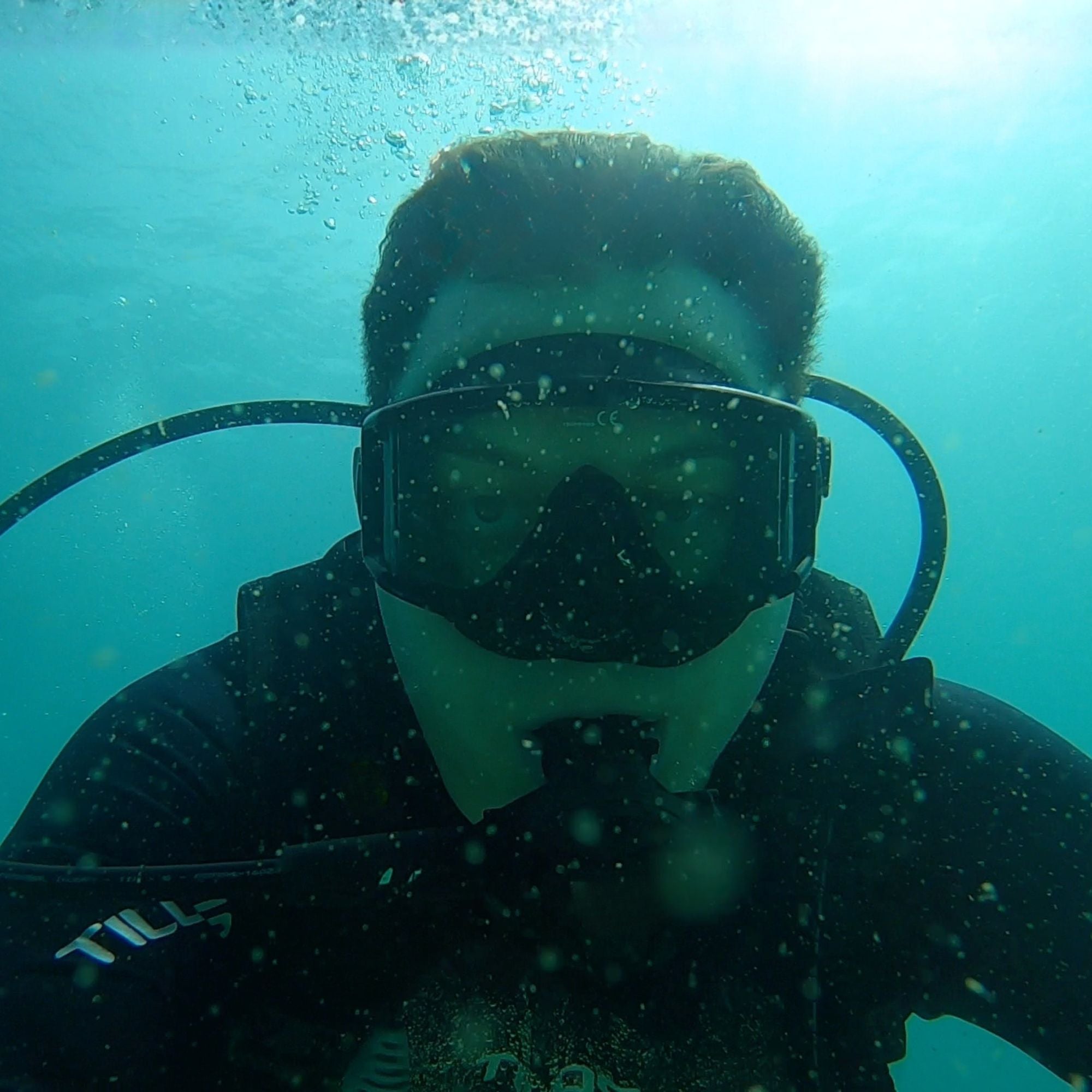 Diver wearing the Tilos Single Lens Panoramic Mask underwater